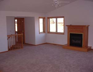 Spacious living room with vaulted ceiling. 
Kozy Heat gas fireplace. 

Large master bedroom, bathroom with walk-in closet. 
Six panel oak doors, with oak woodwork and trim.