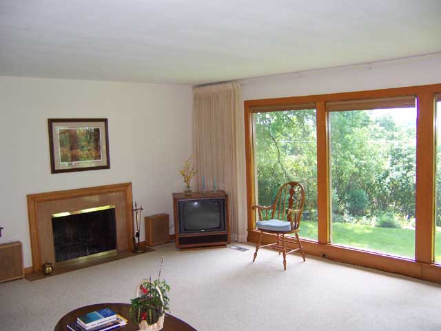 Living room with view of valley and sunsets