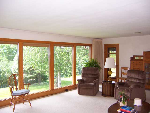 Living room with view of valley and sunsets