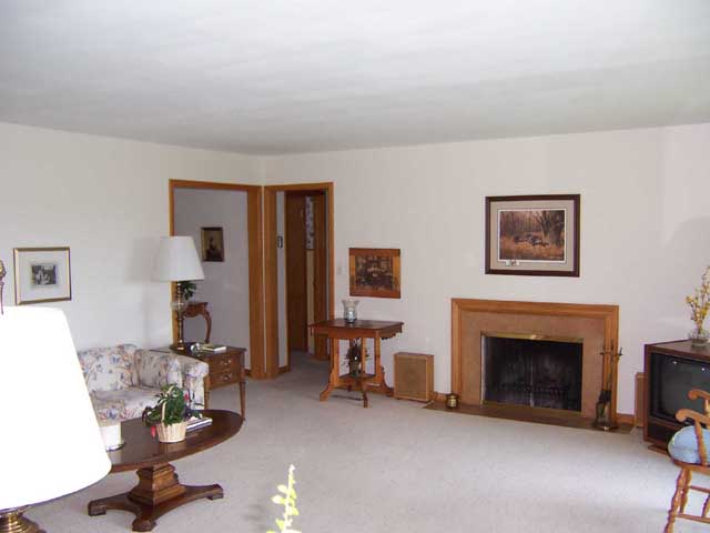 Living room with view of valley and sunsets